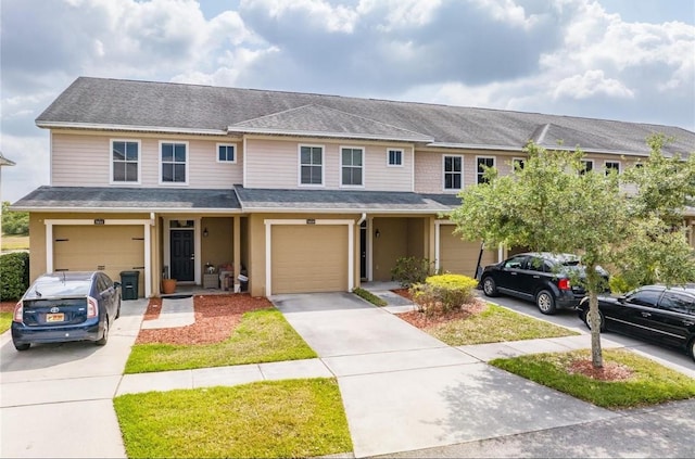 5809 Leopardstown Dr, Tampa, FL 33610 - view of front facade with a garage