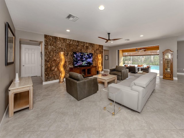 living room with ceiling fan