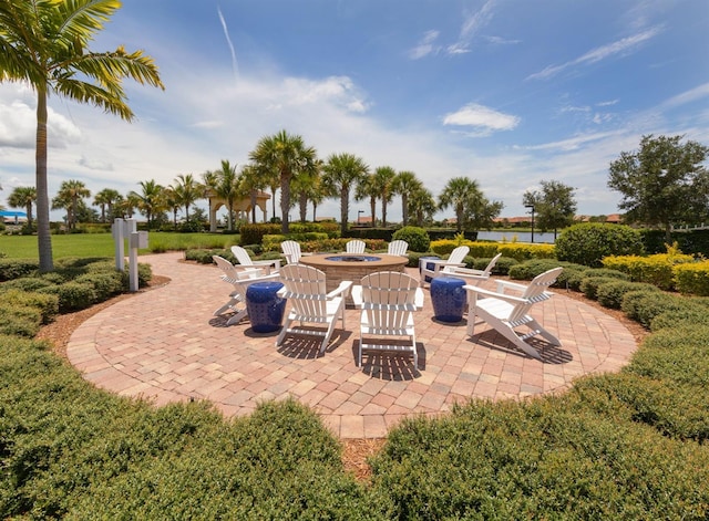 view of patio featuring a fire pit