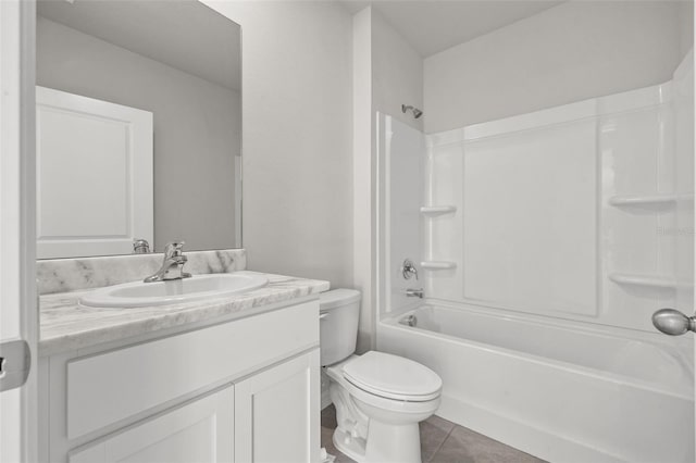 full bathroom featuring tile patterned flooring, vanity, toilet, and shower / washtub combination