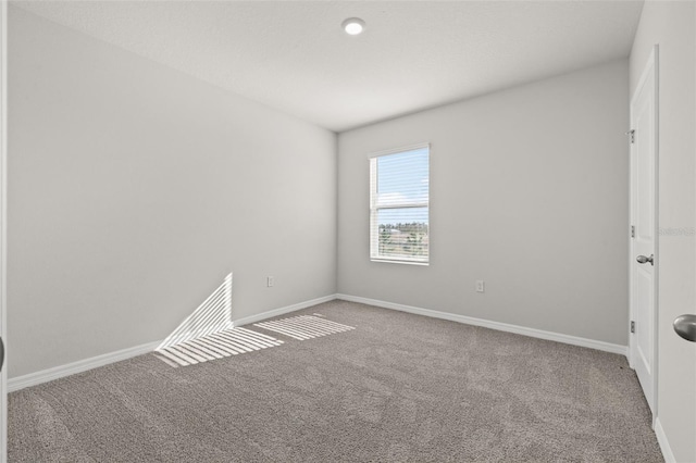 empty room with carpet floors