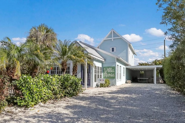 view of front of property with a carport