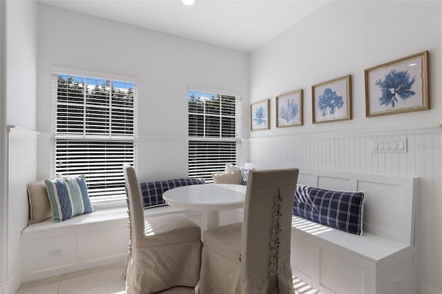 dining space with light tile patterned floors