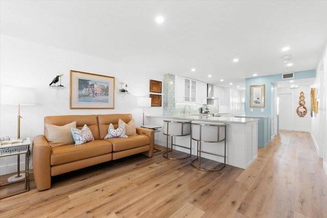 living room featuring light wood-type flooring