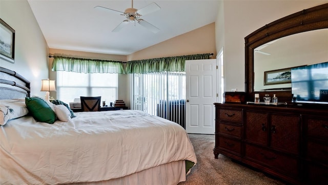 bedroom featuring carpet floors, vaulted ceiling, and ceiling fan