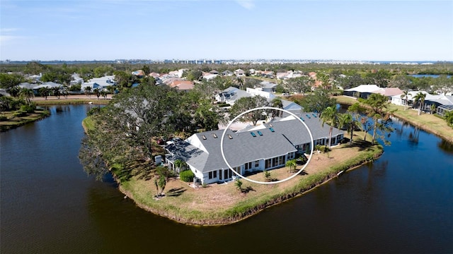 drone / aerial view with a water view