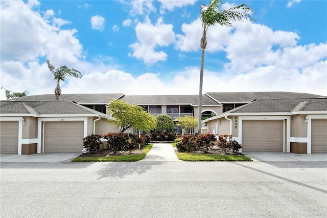 ranch-style home featuring a garage