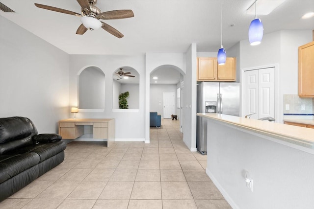 living room with light tile patterned floors