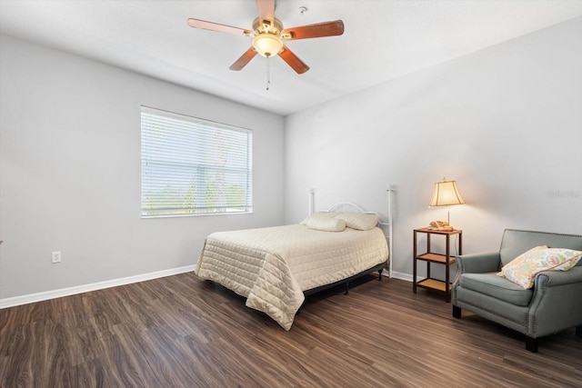 bedroom featuring ceiling fan and dark hardwood / wood-style flooring