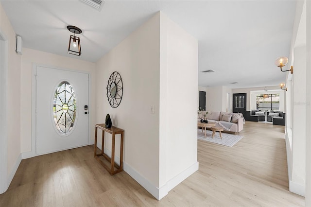 entrance foyer featuring light hardwood / wood-style flooring