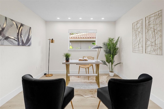 living area with wood-type flooring