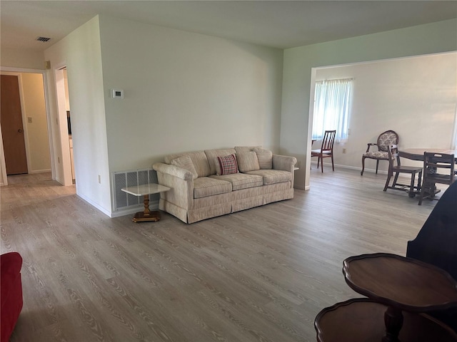 430 Botticelli Dr Unit 430, Nokomis, FL 34275 - living room featuring wood finished floors and baseboards