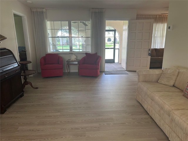 430 Botticelli Dr Unit 430, Nokomis, FL 34275 - living room featuring light wood-style floors
