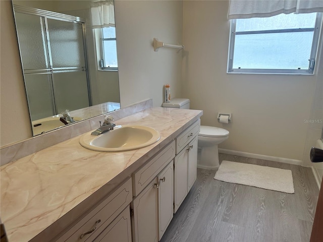 430 Botticelli Dr Unit 430, Nokomis, FL 34275 - full bathroom with a shower with door, plenty of natural light, vanity, and wood finished floors