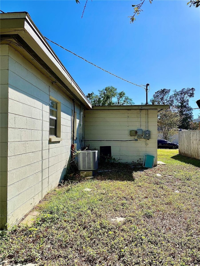 view of property exterior featuring central AC