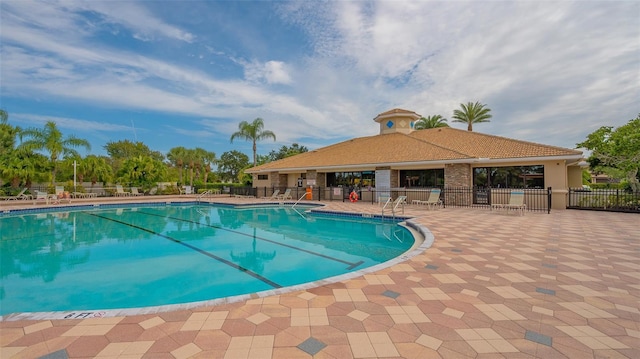 view of pool featuring a patio