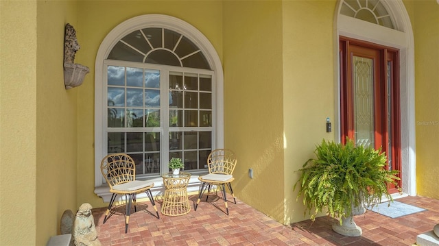 doorway to property with covered porch