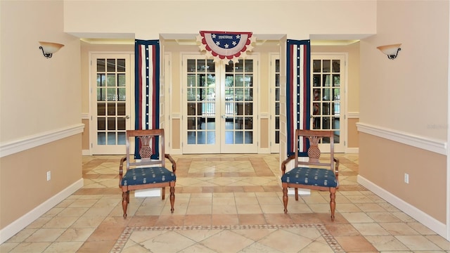 entrance to property featuring french doors