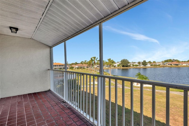 balcony featuring a water view