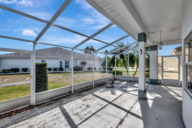 view of patio / terrace with a lanai