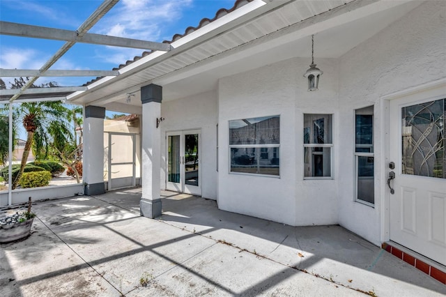 view of patio with a lanai