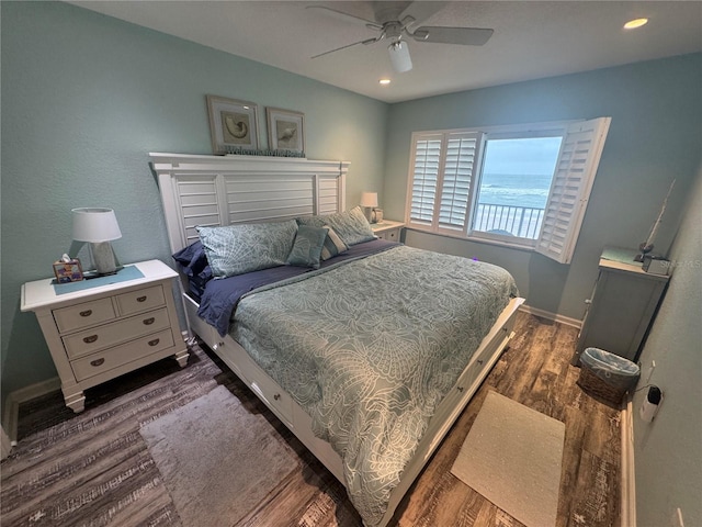 bedroom featuring ceiling fan, baseboards, dark wood-type flooring, and recessed lighting