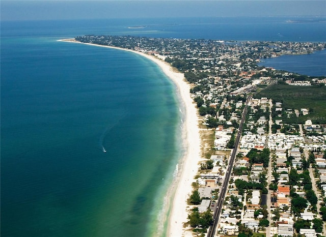 aerial view featuring a water view and a beach view