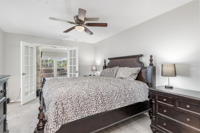 bedroom featuring ceiling fan and light colored carpet