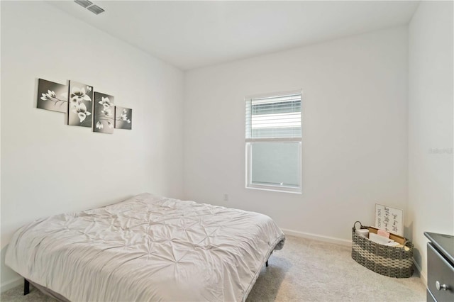 bedroom featuring carpet