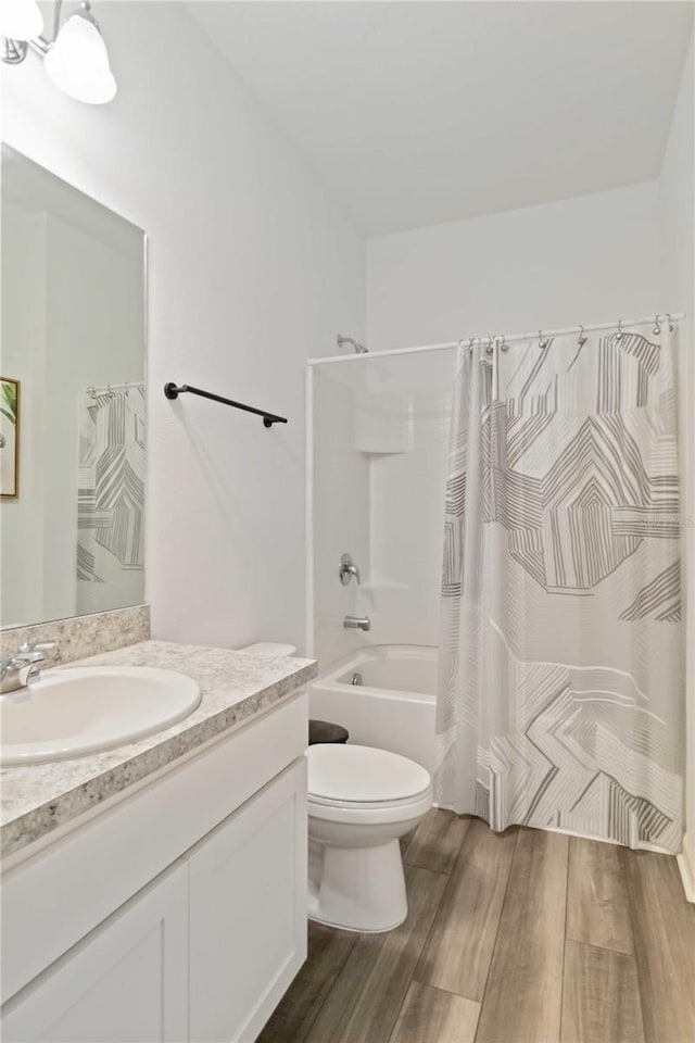 full bathroom with vanity, toilet, and shower / bathtub combination with curtain