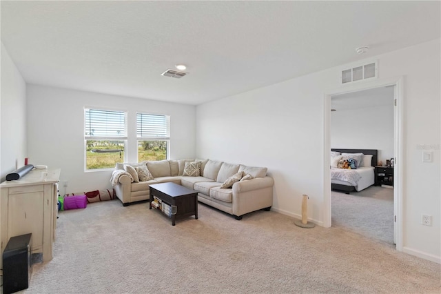 living room with light carpet