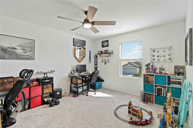 office featuring ceiling fan and carpet