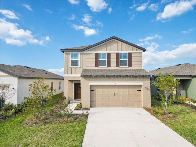 view of front of house featuring a garage and a front yard