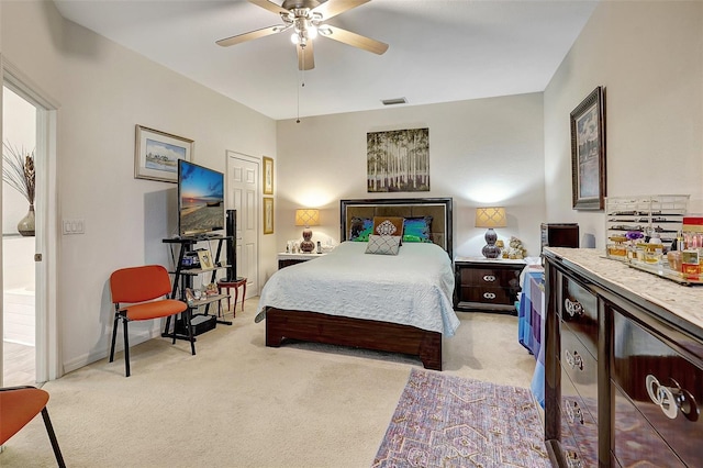 carpeted bedroom with ceiling fan