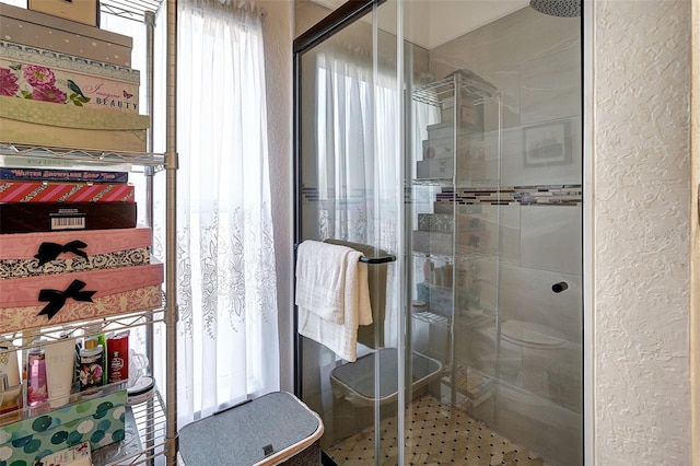 bathroom featuring walk in shower