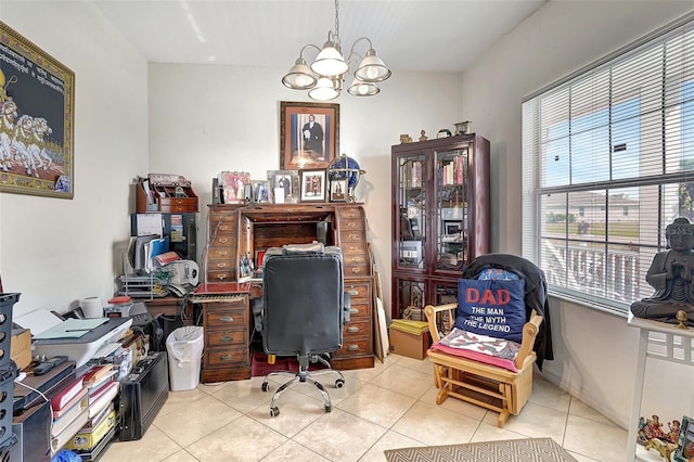 tiled home office with an inviting chandelier