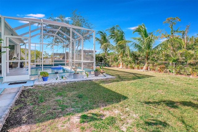 view of yard with a lanai