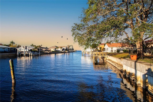 view of water feature with a dock