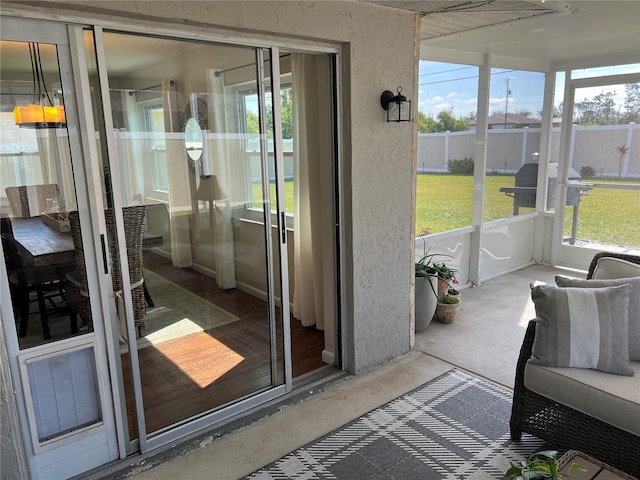 sunroom featuring plenty of natural light