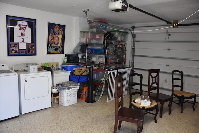 garage featuring a garage door opener and washing machine and dryer