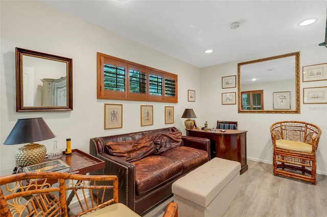 living area with light hardwood / wood-style floors