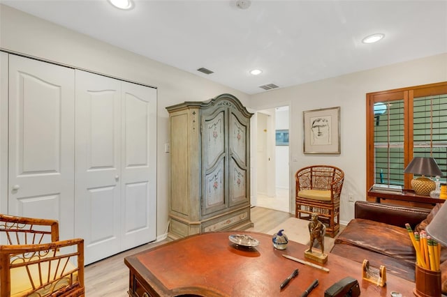 sitting room with light hardwood / wood-style floors