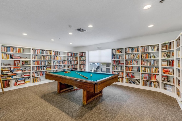 recreation room featuring carpet, a textured ceiling, and pool table