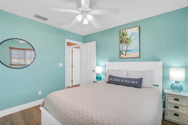 bedroom featuring hardwood / wood-style flooring and ceiling fan