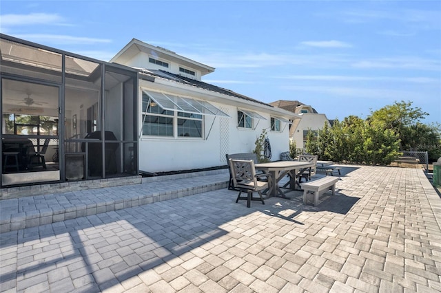 view of patio / terrace with glass enclosure