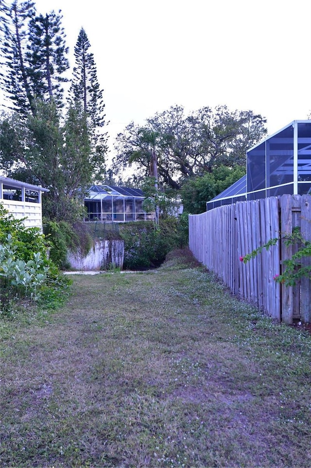 view of yard with fence