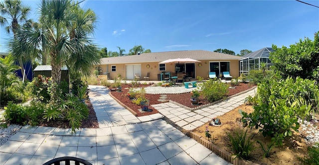 2426 Nassau St, Sarasota, FL 34231 - rear view of property featuring a patio and stucco siding