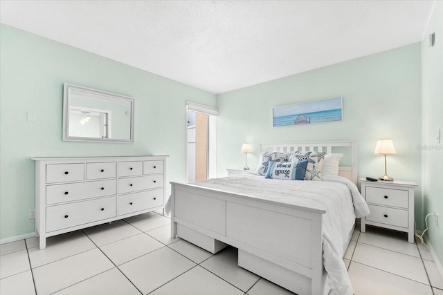 bedroom with light tile patterned floors