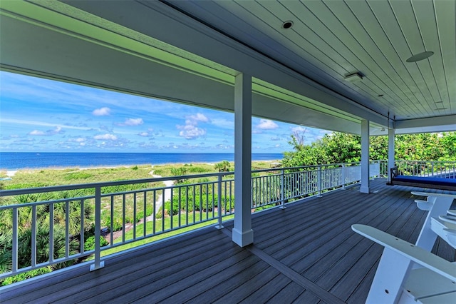 deck featuring a water view