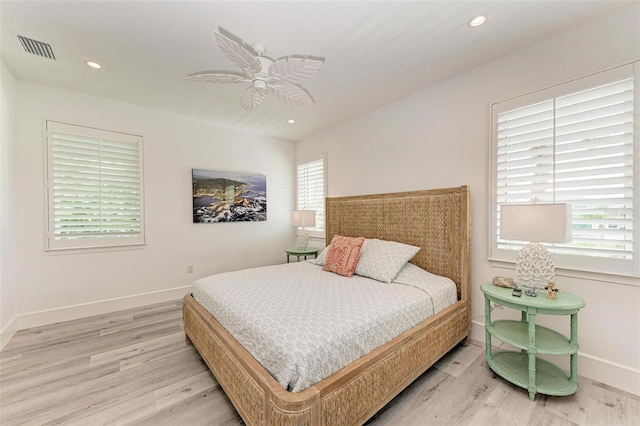 bedroom featuring ceiling fan and light wood-type flooring